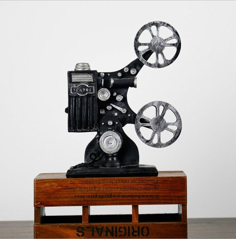 Step back in time with this retro miniature film projector model