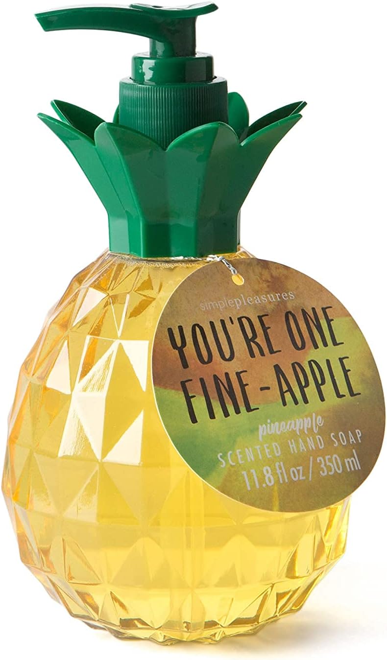 Pineapple-shaped soap dispenser with a green pump top and a tag reading "You're One Fine-Apple." It contains pineapple-scented hand soap, 11.8 fl oz.