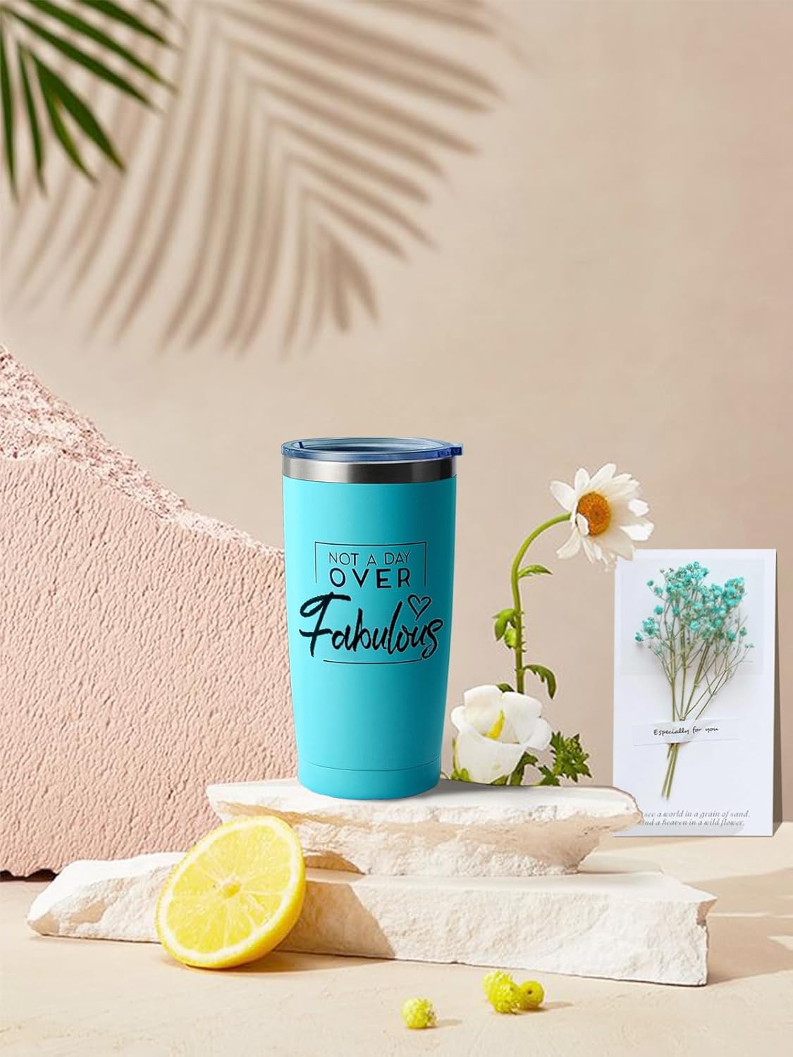 A tumbler which says 'Not a day over Fabulous'