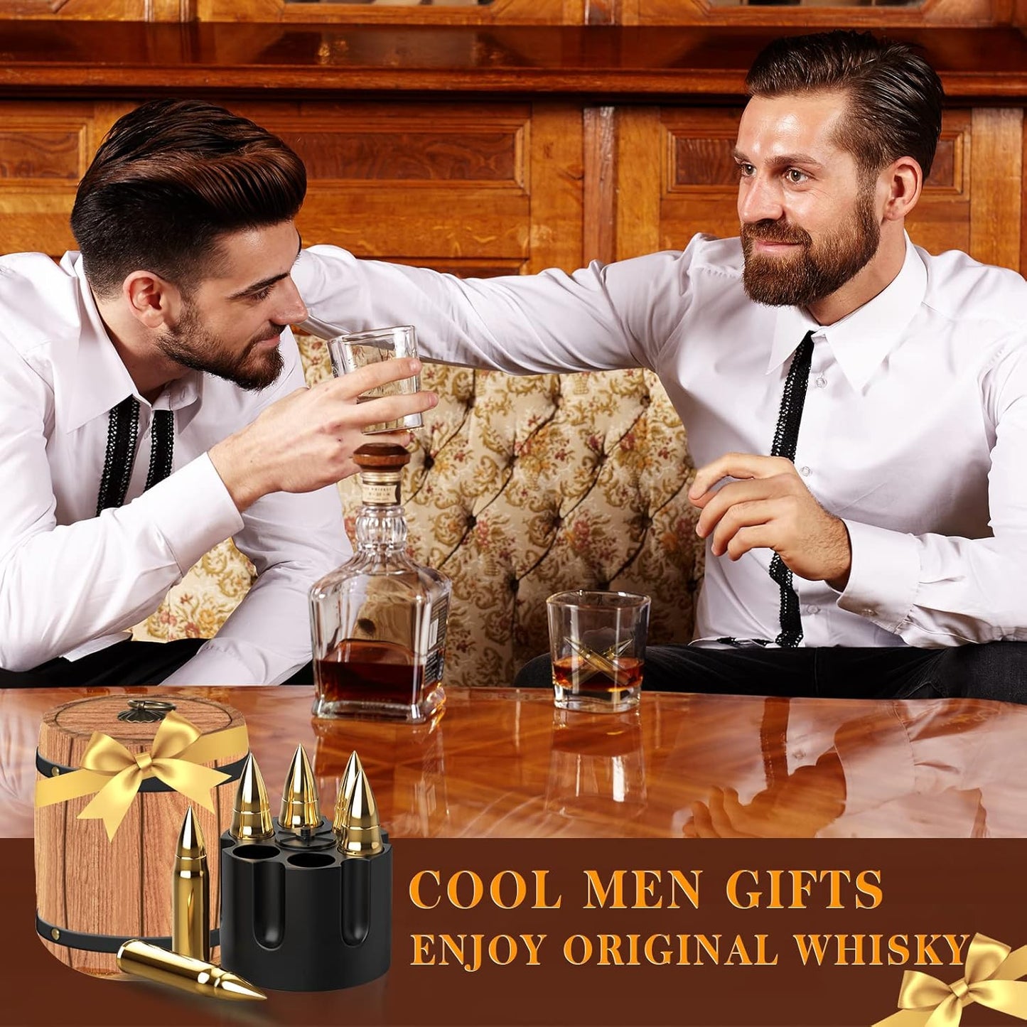 Two well-dressed men in white shirts and black ties enjoy whiskey in an elegant, vintage-style lounge. One man pours whiskey from a decanter while they engage in conversation. In the foreground, a gift set featuring bullet-shaped whiskey stones, a wooden barrel-style box, and a storage tray is displayed. The text overlay reads, "COOL MEN GIFTS - ENJOY ORIGINAL WHISKY.