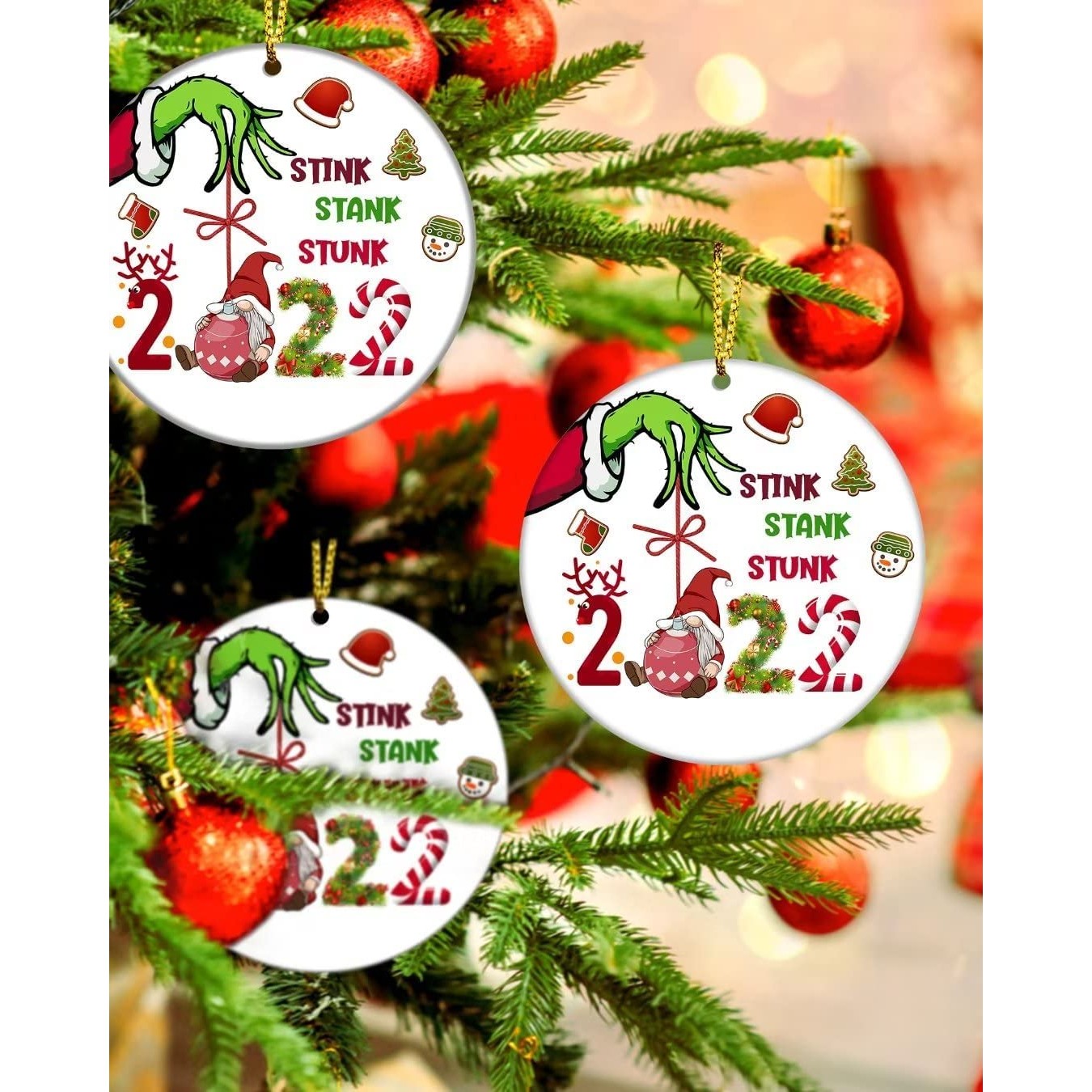 https://www.oddgifts.com/cdn/shop/products/grinch-christmas-tree-ornament-02.jpg?v=1669406323&width=1445